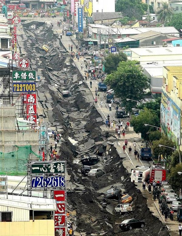 An aerial view showing a caved-in road caused by the underground explosions in Kaohsiung, Southern Taiwan