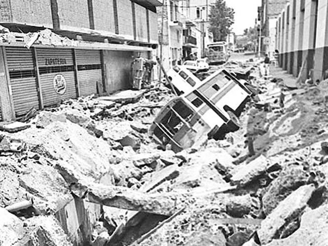 A wrecked road in Guadalajara city because of the new water pipes built too close to an existing gasoline pipeline cause explosions