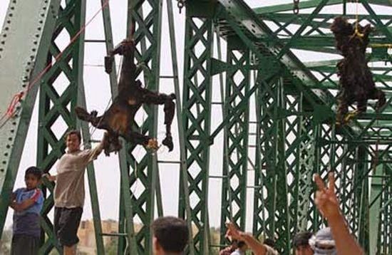 The four American contractors were killed, burnt and hung over a bridge