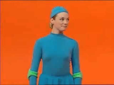 One of the casts of 4 Square, a Canadian television show for kids, wearing all blue outfits with an orange background.