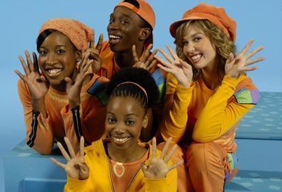 Casts of 4 Square, a Canadian television show for kids, wearing a combination of color yellow and orange outfits.