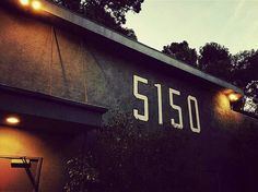 The outside of 5150 Studios with lights on