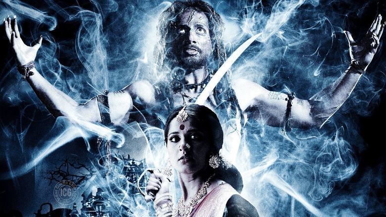 Anushka Shetty with a shocked face while Sonu Sood with his arms open in the 2009 Indian Telugu-language horror fantasy film, Arundhati