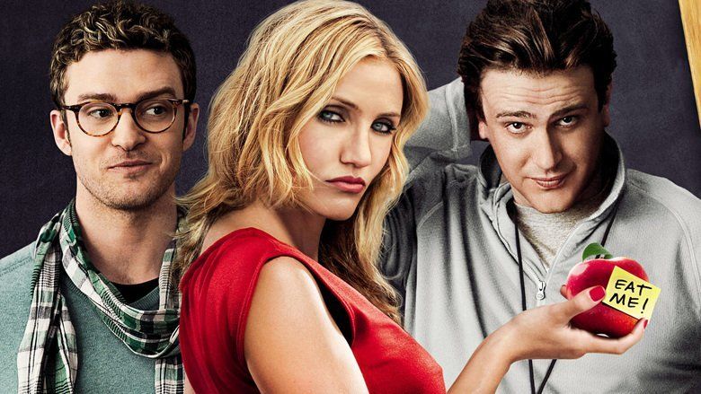 Cameron Diaz wearing a red dress, Justin Timberlake wearing a gray shirt, eyeglasses, and scarf while Jason Segel wearing a gray jacket