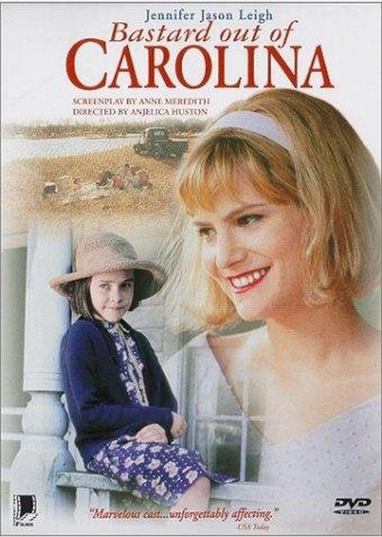Jena Malone as Ruth Anne and Jennifer Jason Leigh as Anney smiling (from left to right), in a DVD cover for Bastard Out of Carolina, a 1996 American drama film made by Showtime Networks, directed by Anjelica Huston. Jena with short hair wearing a nude hat, a blue dress with prints, and a blue long sleeve blazer; while Jennifer with short blonde hair with bangs and a lavender headband is wearing a lavender V-neck sleeve top.