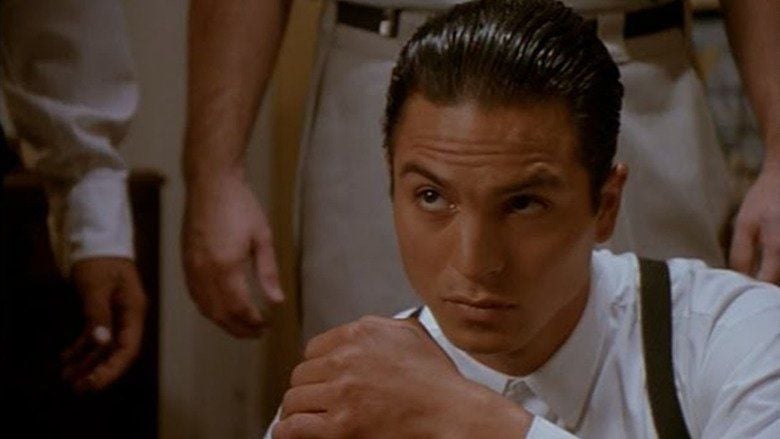 Benjamin Bratt, looking serious in a movie scene from Blood In Blood Out, 1993