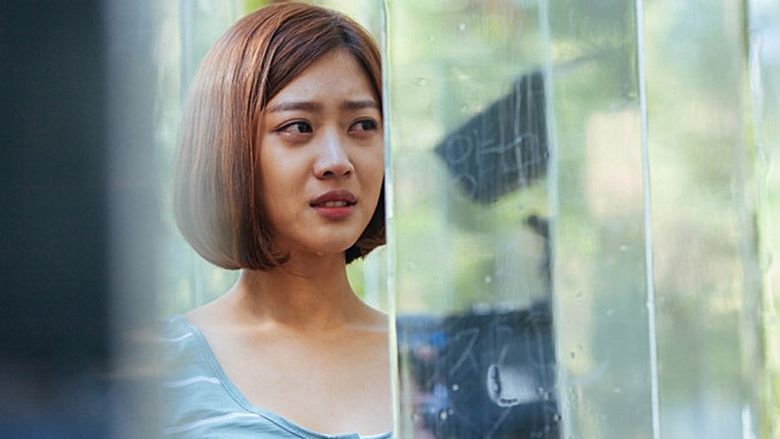 Jo Bo-ah is crying while wearing a white and gray blouse in a scene from the 2014 South Korean romantic thriller film, Innocent Thing