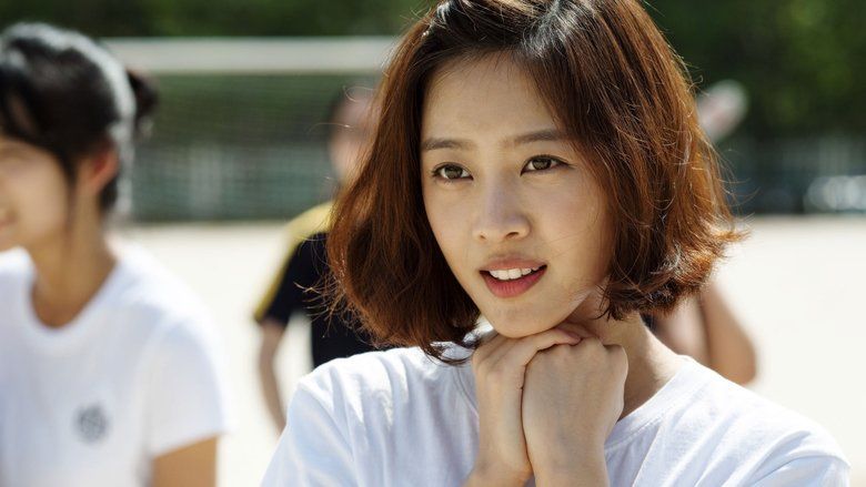 Jo Bo-ah with her hands folded together while wearing a white shirt in a scene from the 2014 South Korean romantic thriller film, Innocent Thing