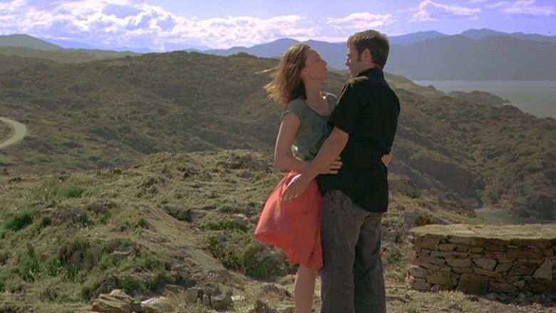 Leaving (2009 film) Kristin Scott Thomas and Sergi López hugging each other on top of a mountain (a movie scene)