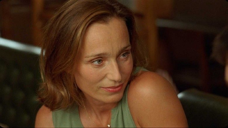 Leaving (2009 film) Kristin Scott Thomas wearing a sleeveless shirt (a movie scene)