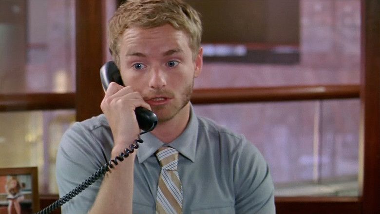 Christopher Masterson talking on the phone in a movie scene from the 2009 romantic comedy film Made for Each Other