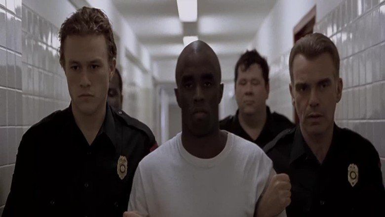 Billy Bob Thornton, Sean 'Diddy' Combs, Heath Ledger, and John McConnell in a movie scene from the 2001 film Monster's Ball