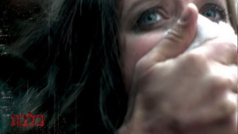 Someone's hand is covering Ania Bukstein's mouth in a scene from the 2010 Israeli film, Rabies