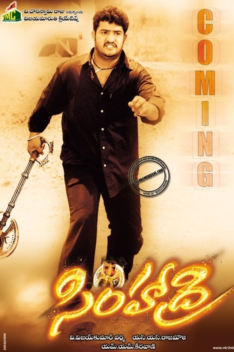 Jr. NTR wearing black long sleeves and black pants at the movie poster of 2003 film, Simhadri