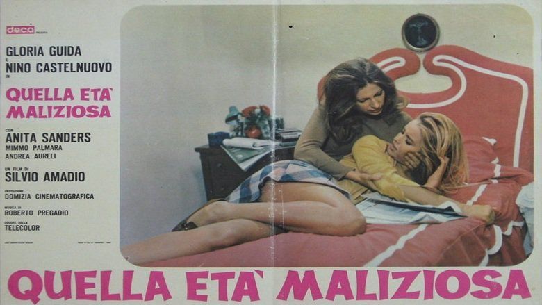 Gloria Guida and Anita Sanders lying on the bed in a movie scene from the 1975 Italian erotic drama film, That Malicious Age