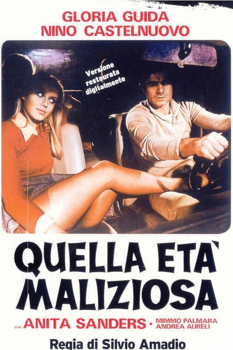 Nino Castelnuovo and Gloria Guida riding in the car in the movie poster of the 1975 Italian erotic drama film, That Malicious Age