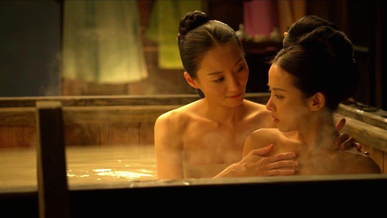 Jo Eun-ji as  Geum-ok and Jo Yeo-jeong as Shin Hwa-yeon bathing together in a scene from the film The Concubine, 2012.
