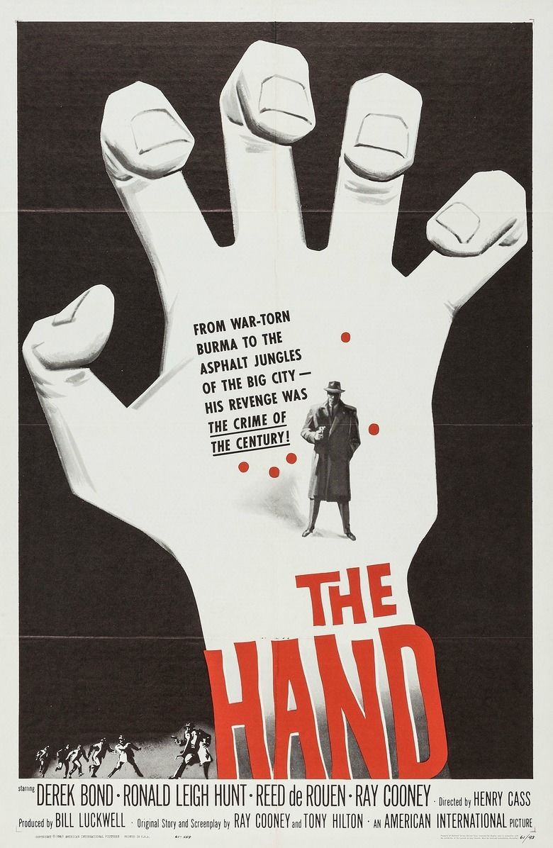 Movie poster of The Hand, a 1960 British horror film featuring a big hand with a man holding a gun, wearing a hat, coat, and pants.