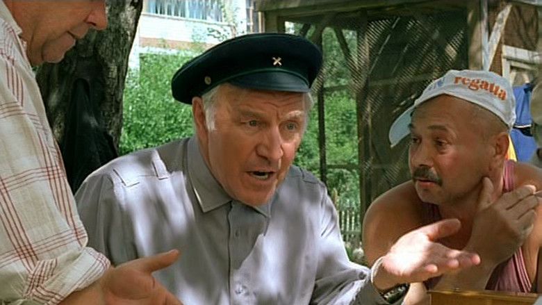 Scene from "The Rifleman of the Voroshilov Regiment" featuring Mikhail Ulyanov as Ivan Fyodorovich Afonin talking to his friends.