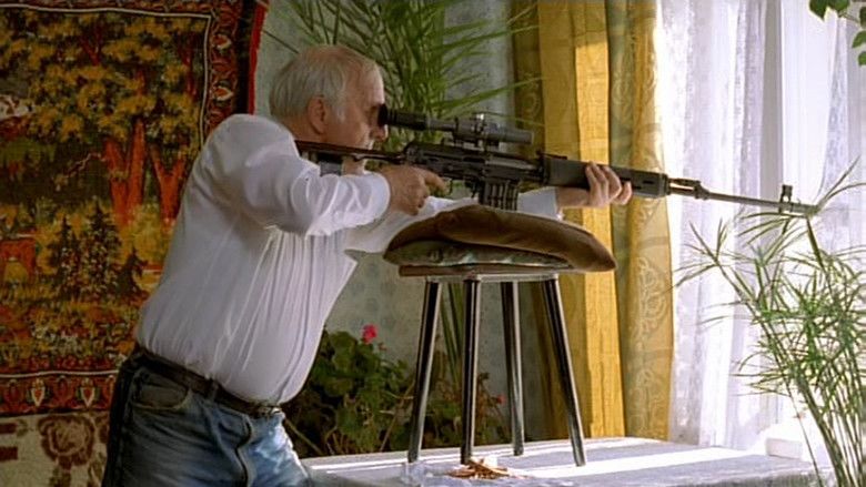 Mikhail Ulyanov holding a sniper, a movie scene from "The Rifleman of the Voroshilov Regiment", a 1999 Russian action and drama film