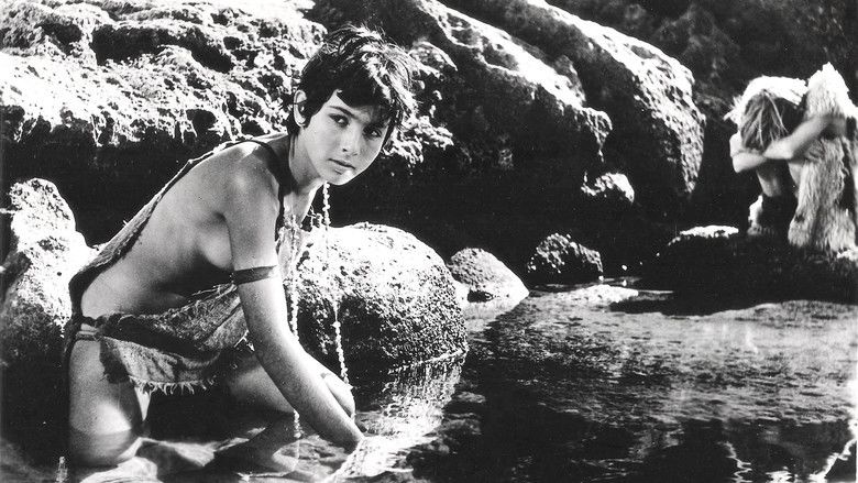 Cleopatra Rota at the river and wearing a ripped cloth in a scene from the 1963 movie "Young Aphrodite"