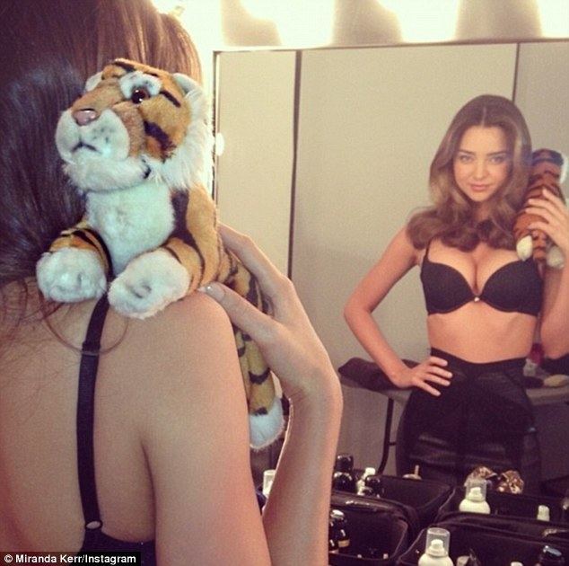 A Glimpse of Tiger movie scenes Grrrr A mesmerizing Miranda Kerr makes a new friend in the make up chair