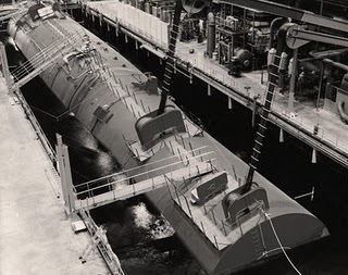 The S5G reactor plant floats in a tank of water to simulate the engine room of a submarine