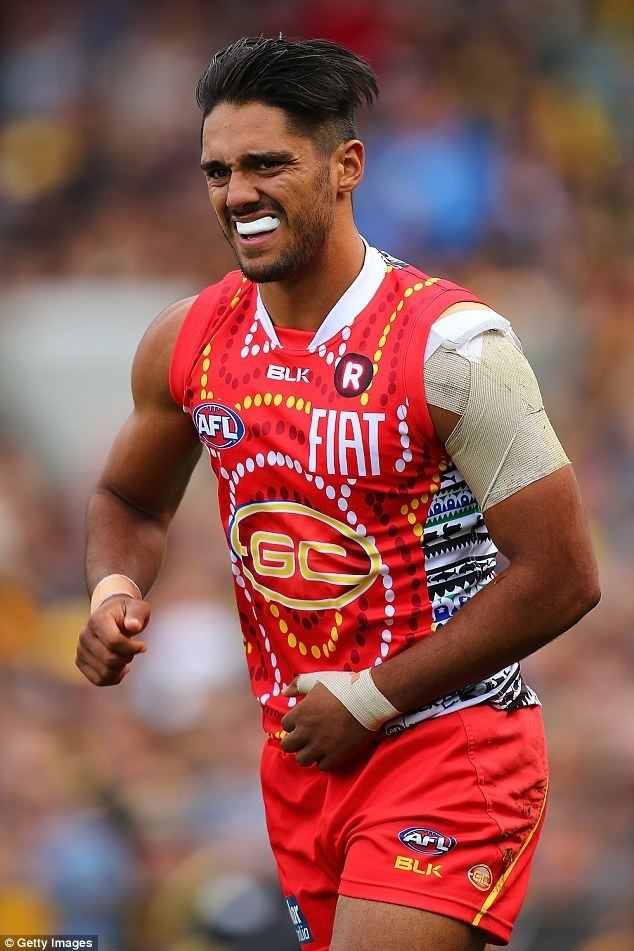 Aaron Hall (footballer) AFL Gold Coast Suns player Aaron Hall called a monkey by a fan