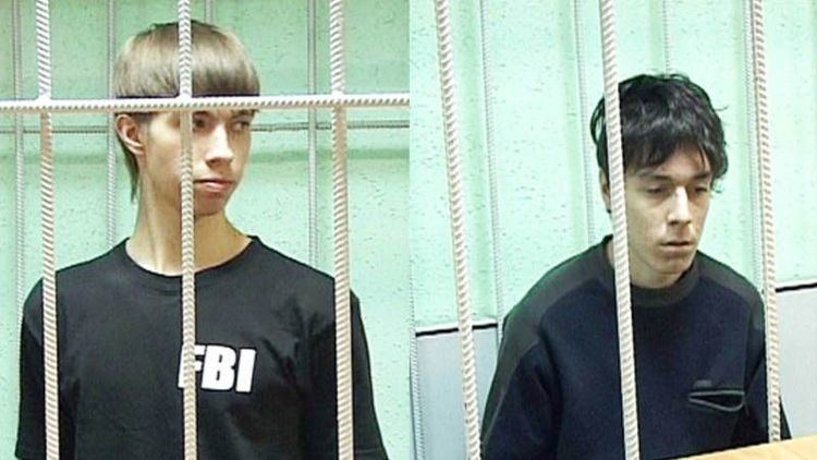 Artyom Alexandrovich Anoufriev and Nikita Vakhtangovich Lytkin in prison while wearing a black t-shirt