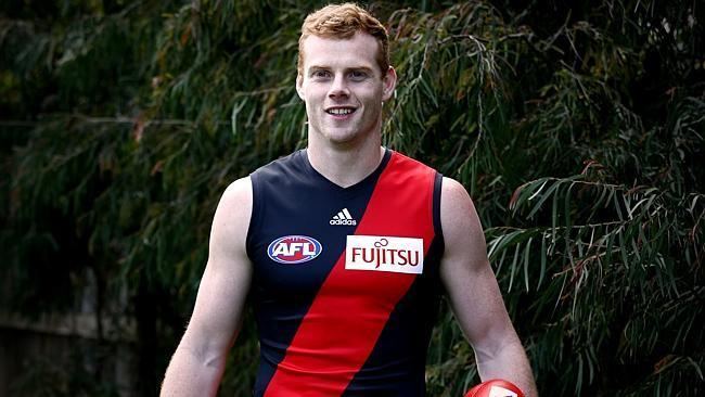 Adam Cooney Adam Cooney tries on his new colours after being traded