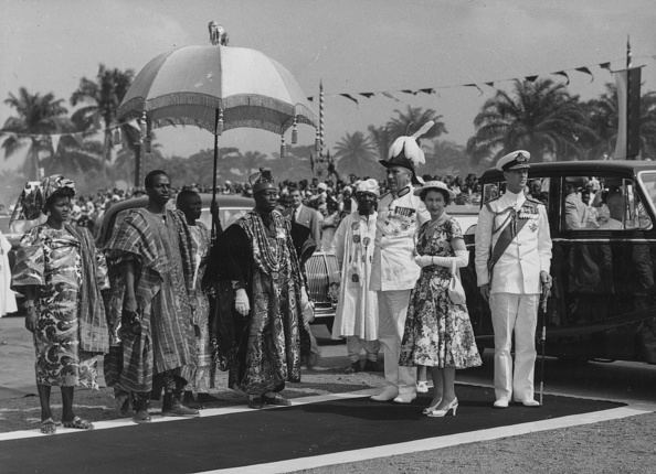 Adeniji Adele Oba Adeniji Adele II King of Lagos stands under an umbrella