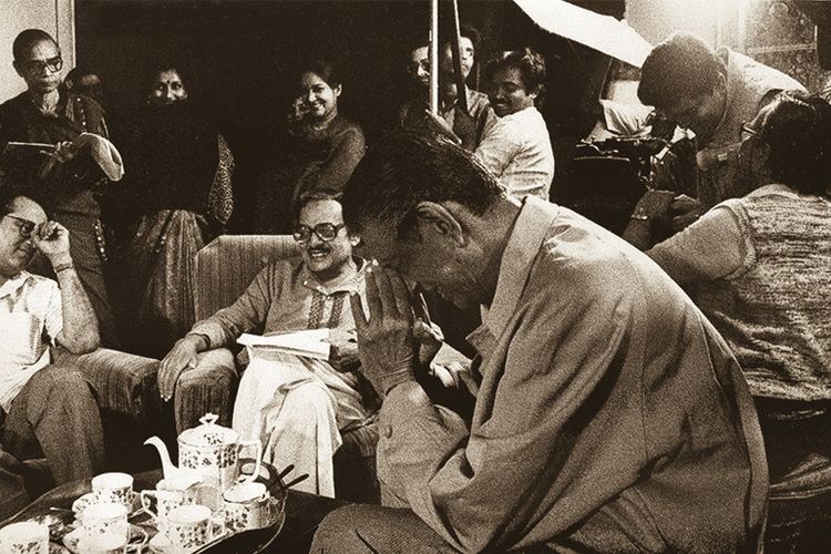 Agantuk movie scenes A rare production still of the film Satyajit Ray is in the foreground 