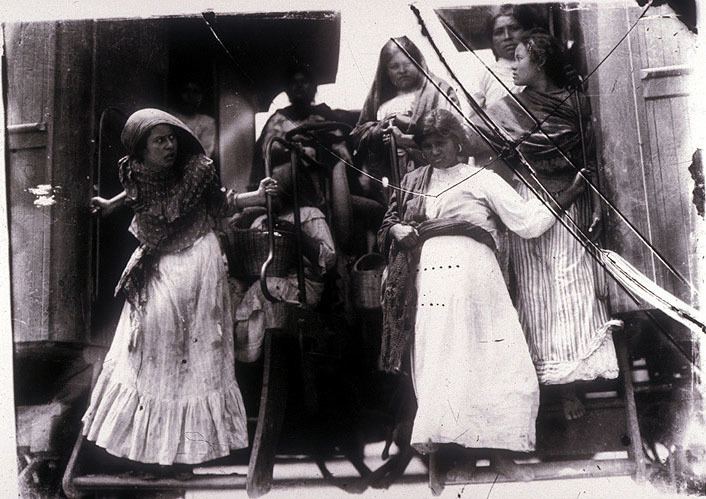 Agustins Newspaper movie scenes Mexico Revolution Women disembarking from a train Photo by Agust n Victor Casasola 