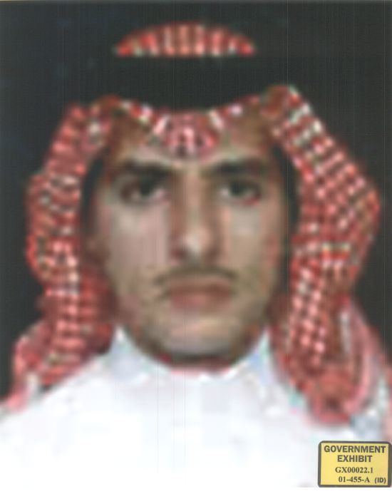 Ahmed al-Nami with mustache while wearing a ghutrah with agal and white long sleeves