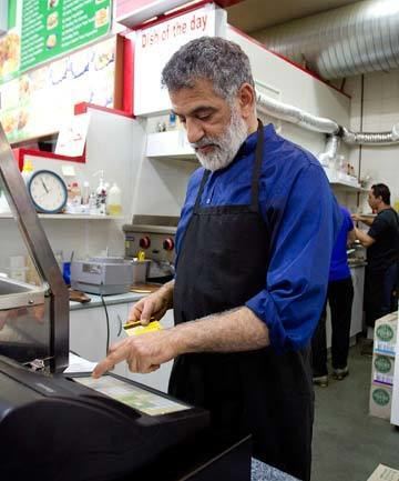 Ahmed Zaoui Zaoui making lunches on K Rd national Stuffconz