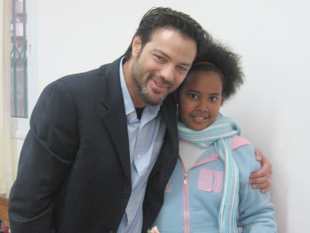 Aki Avni Actor Aki Avni charms needy Israeli children with his famous smile