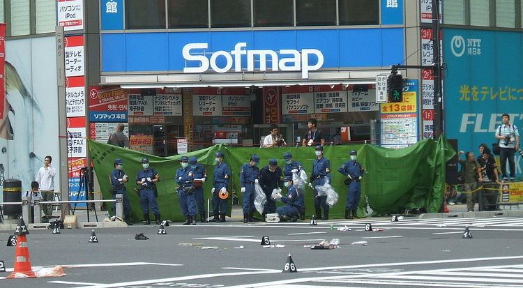 The crossing in Akihabara with the police checking on the site where the incident happened
