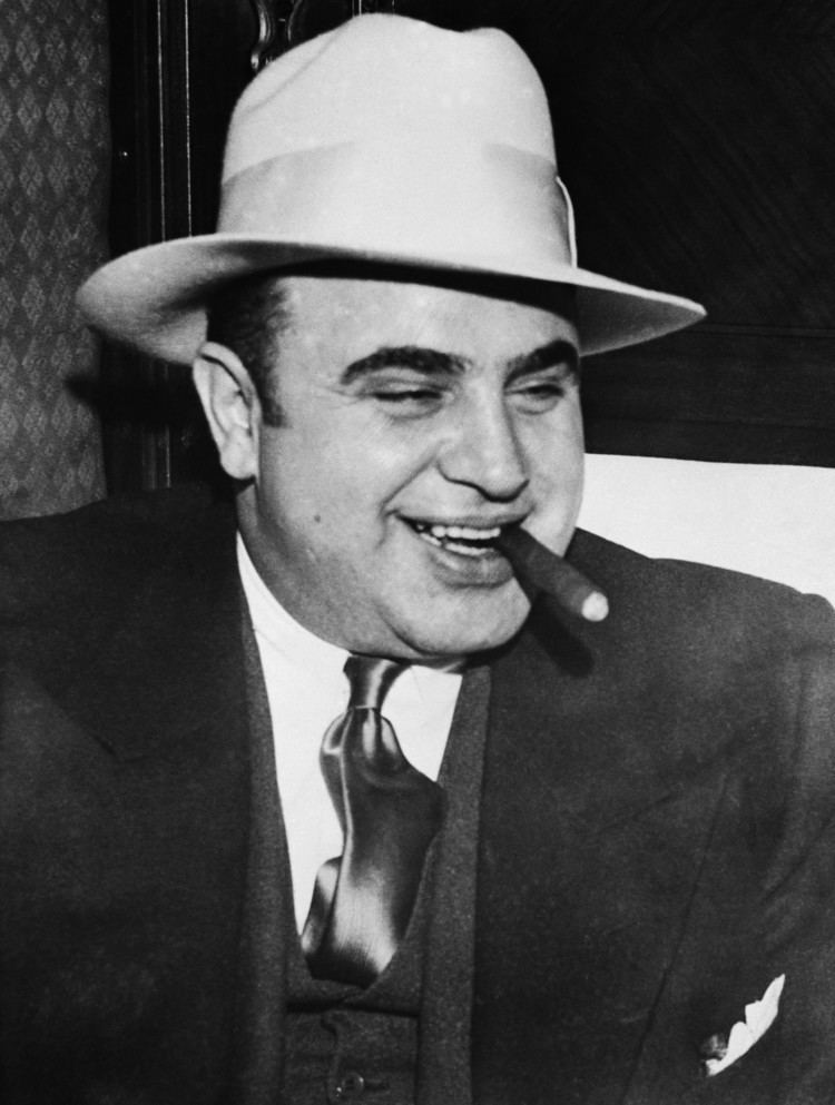 Al Capone gangsteralcaponesmokingcigar Al Capone and