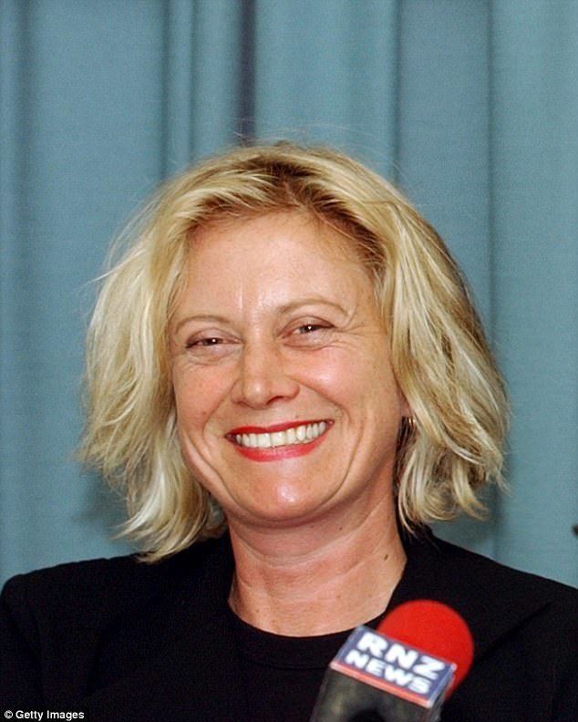 Alannah Currie smiling and wearing black blouse