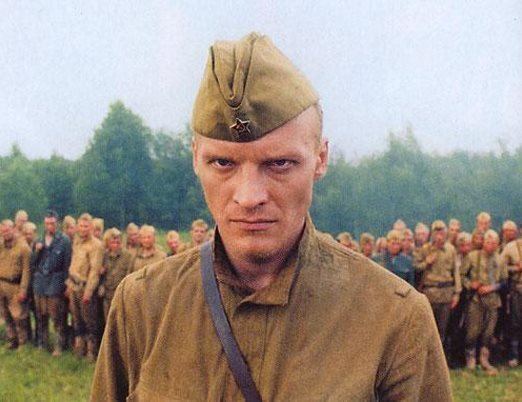 Aleksei Serebryakov wearing military uniform in a scene from 2004 tv show, The Penal Battalion