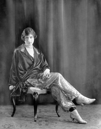 Alexander Bassano Woman modeling eveningwear for the retailer Harrods 1925