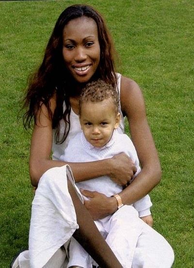 Alexandre Coste at a young age with his mother Nicole Coste wearing a white dress and a watch.