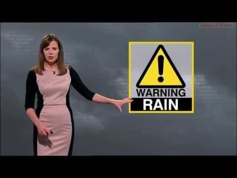Alexis Green wearing black and pink dress while at work as a weather presenter