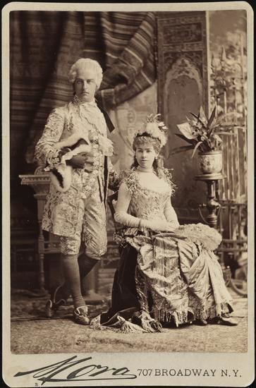 Alice Claypoole Vanderbilt sitting on the chair and dressed as the “Electric Light” with his husband Cornelius Vanderbilt