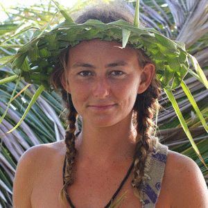 Alison Teal wearing a coconut palm leave hat