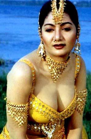 Alphonsa (actress) wearing sexy yellow clothes with gold-colored shiny beads