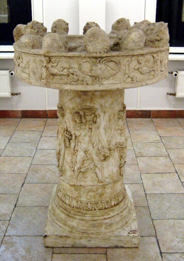 The Altar of the Twelve Gods representing Zeus, Hera, Poseidon, Demeter, Apollo, Artemis, Hephaestus, Athena, Ares, Aphrodite, Hermes, and Dionysus
