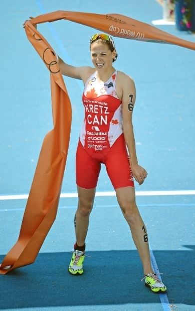 Amélie Kretz Amelie Kretz of Canada crosses the finish line to win the Elite