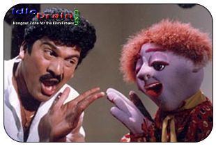 Rajendra Prasad and the doll in a scene from 2001 movie, Ammo Bomma