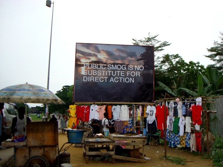 A billboard about Public Smog by Amy Balkin found in Doula, Cameroon in 2009.